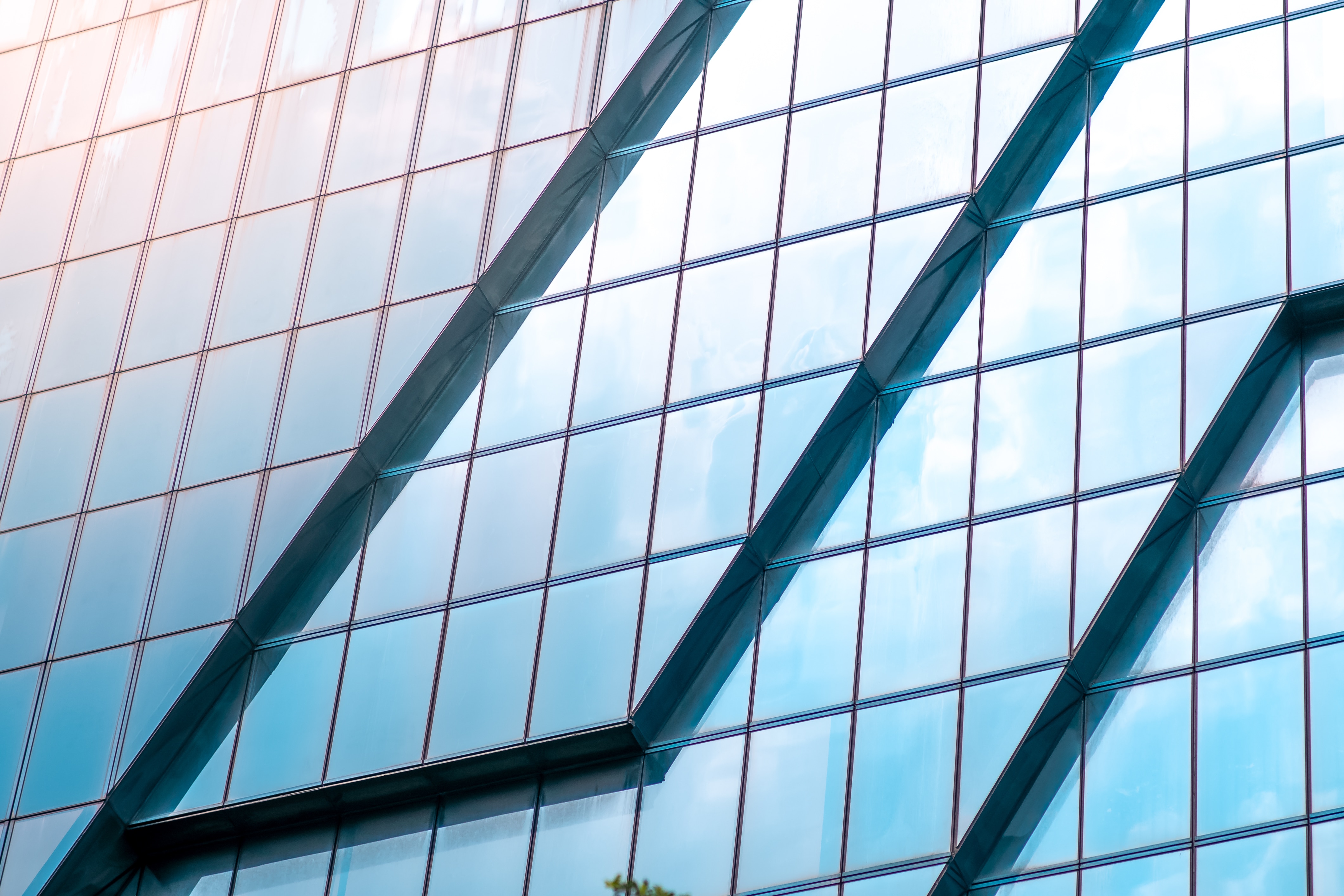 Blue,Glass,Windows,Of,Modern,Office,Building,Close,Up.,Facade